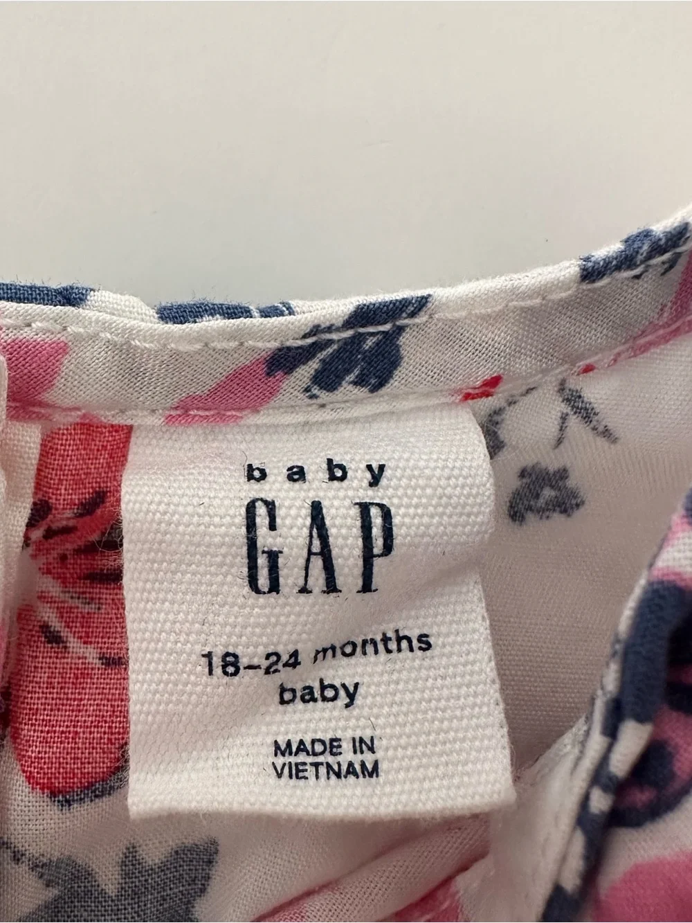 GAP Baby Girl White Sleeveless Romper with Navy, Red and Pink Floral Print